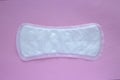 Woman`s Sanitary Pad on Pink Background, Feminine Hygiene Concept