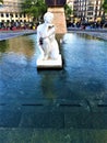 Woman`s statue, fountain and seagull in Barcelona, Spain