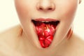 Woman's tongue. Woman with open mouth and cherry toungue.