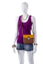 Woman's top and bicolor bag.