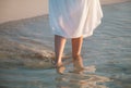 Woman's walking along the seacoast Royalty Free Stock Photo