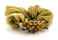 Woman's yellow scrunchy (hairpin) with jewelry isolated