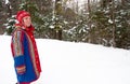 Woman in Saami hat and blue felt coat Royalty Free Stock Photo