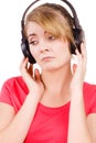 Woman sad girl in big headphones listening music Royalty Free Stock Photo