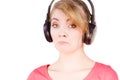 Woman sad girl in big headphones listening music Royalty Free Stock Photo