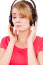 Woman sad girl in big headphones listening music Royalty Free Stock Photo