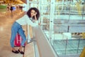 Woman sad and unhappy at the airport with flight canceled