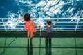 A woman is sailing on a cruise ship with her child Royalty Free Stock Photo