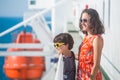 A woman is sailing on a cruise ship with her child Royalty Free Stock Photo