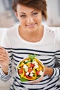 Woman, salad and healthy vegetables in portrait for diet with detox, breakfast and lunch at home. Young person eating Royalty Free Stock Photo