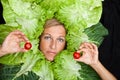 Woman with salal leafes around her head. Royalty Free Stock Photo