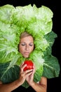 Woman with salal leafes around her head. Royalty Free Stock Photo