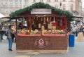 Woman sales sausage at Christmas market at Liberty Square