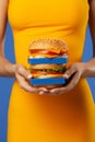 Art woman yellow concept hamburger fast blue burger meal hand healthy