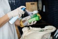 Woman Sanitizing Groceries And Other Food