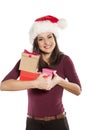 Woman with Santa Claus hat and a gift boxes Royalty Free Stock Photo