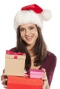 Woman with Santa Claus hat and a gift boxes Royalty Free Stock Photo