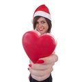 Woman in Santa hat holding a heart Royalty Free Stock Photo