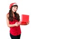 Woman in santa hat opening Christmas gift box isolated on white with copyspace. Happy girl unpacking her present Royalty Free Stock Photo