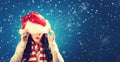 Woman with Santa hat pulled over her eyes Royalty Free Stock Photo