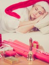 Woman in Santa hat sleeping on couch Royalty Free Stock Photo