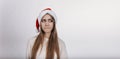 Woman in santa hat suspects something