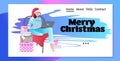 Woman in santa hat using laptop girl buying online happy new year merry christmas holidays celebration Royalty Free Stock Photo