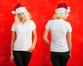 Woman with Santa hat wearing white polo shirt Royalty Free Stock Photo