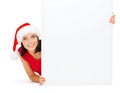 Woman in santa helper hat with blank white board Royalty Free Stock Photo