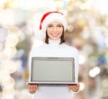 Woman in santa helper hat with laptop computer Royalty Free Stock Photo
