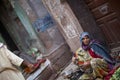 Woman in sari selling vegetables on the street in