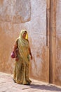 Woman in sari walking at Agra Fort, Uttar Pradesh, India