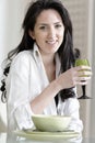 Woman sat at the dinner table Royalty Free Stock Photo