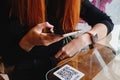 Woman scanning the barcode qr code in restaurant or cafe Royalty Free Stock Photo