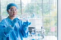 Woman science specialist laboratory working at lab to checking test tubes Royalty Free Stock Photo