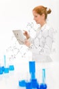 Woman scientist in laboratory with touch screen Royalty Free Stock Photo