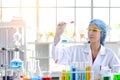 Woman scientist looking at testing sample in laboratory. Royalty Free Stock Photo