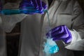 A woman scientist performing Organic reaction under fuming condition in a laboratory Royalty Free Stock Photo