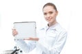 Woman scientist showing digital tablet with blank screen