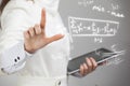 Woman scientist or student working with various high school maths and science formula. Royalty Free Stock Photo