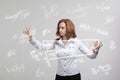 Woman scientist or student working with various high school maths and science formula. Royalty Free Stock Photo