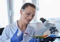 Woman scientist testing pepper in lab Royalty Free Stock Photo