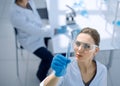 Woman scientist working in a modern laboratory Royalty Free Stock Photo