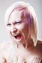 A woman screaming with crazy expression Royalty Free Stock Photo