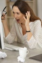 woman screaming in frustration at computer Royalty Free Stock Photo