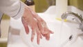 Woman scrupulously washing her hands Royalty Free Stock Photo