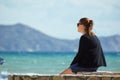 Woman by the sea