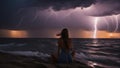 woman in the sea at sunset she was standing on the shore, watching the lightning storm over the sea at sunset. Royalty Free Stock Photo