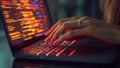Female Hacker Woman Typing on a Laptop Notebook Keyboard Accessing The Dark Web Internet Network (Computer Coding) Royalty Free Stock Photo