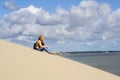 Woman seatting on the beach